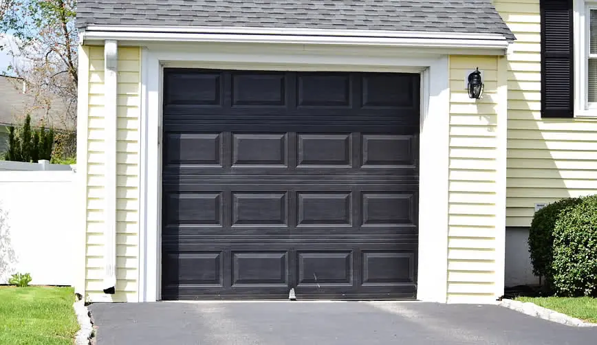 Modern flush garage door with vertical glass